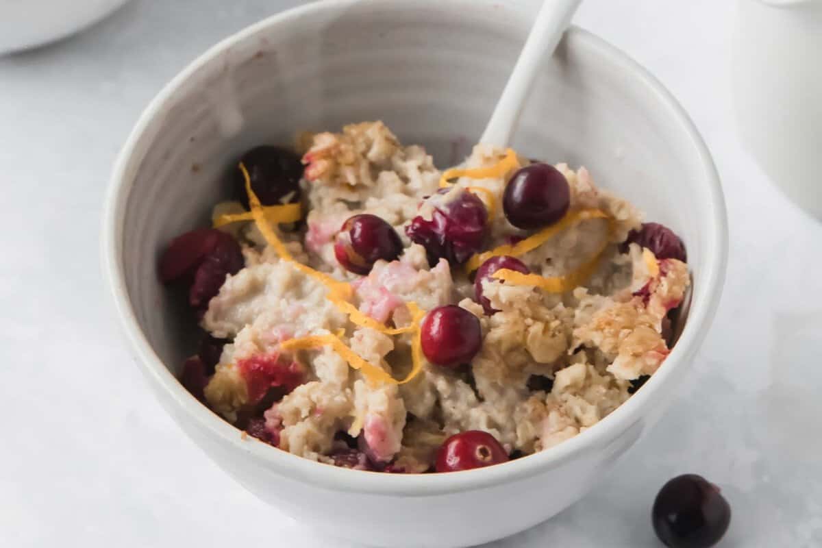 a bowl with cranberry baked oatmeal