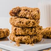 stack of four pumpkin oatmeal cookies and a few more on the back