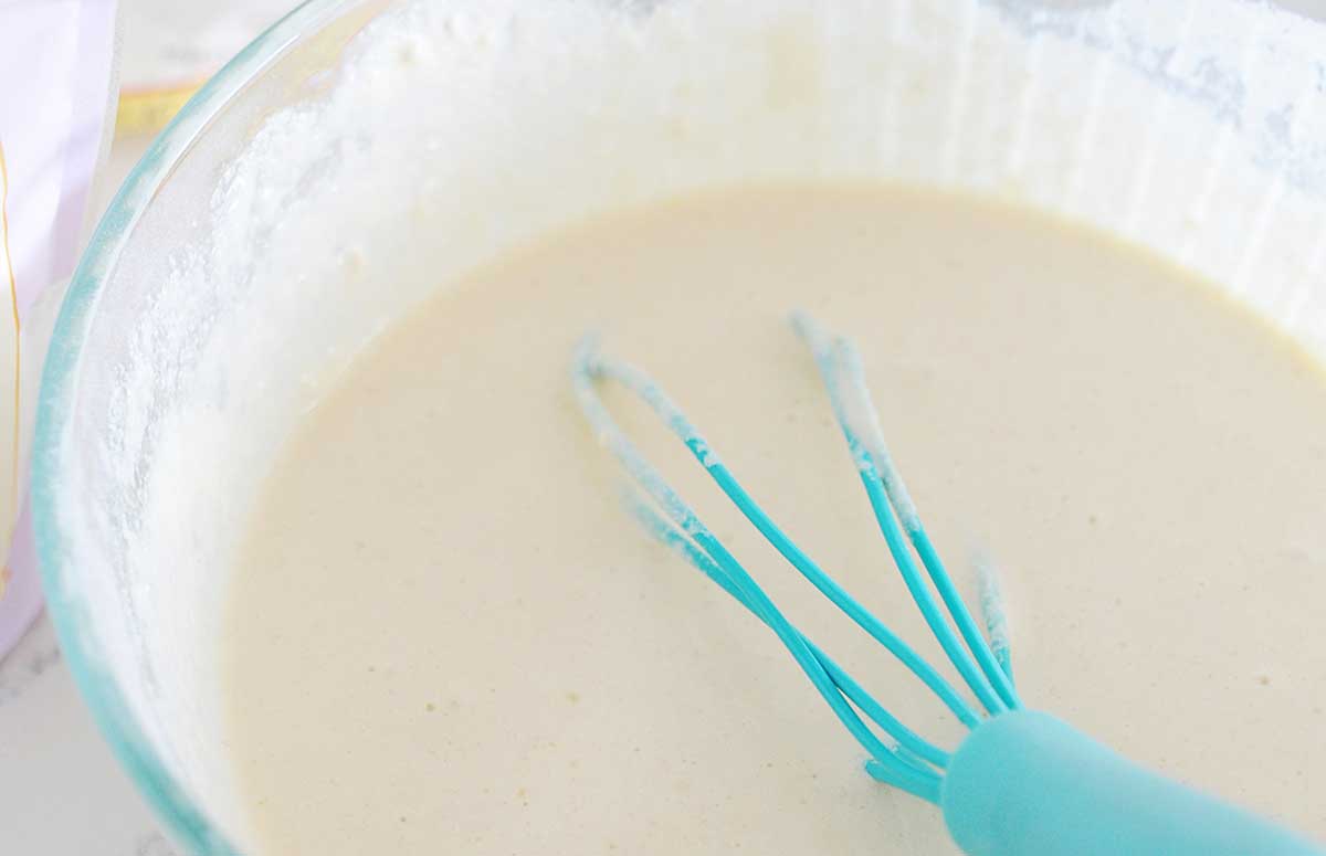 close up of waffle batter in a bowl