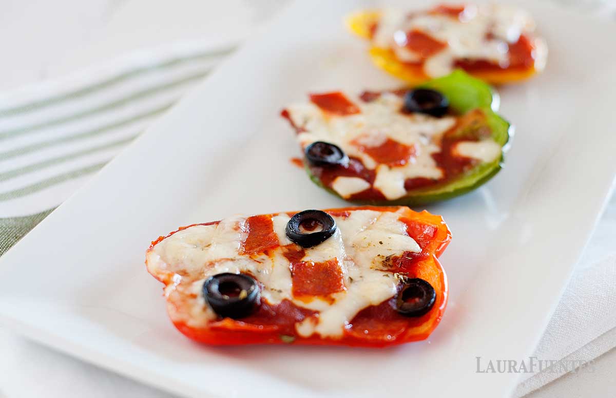 three bell pepper pizzas on a plate