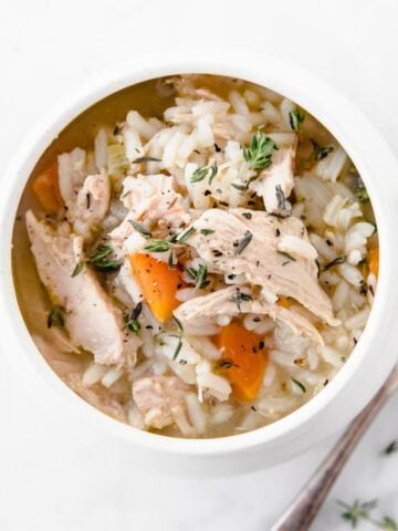 a bowl of turkey and rice soup
