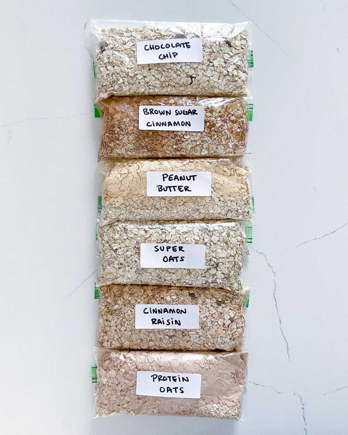 flavored oatmeal packets labeled and lined up on a countertop