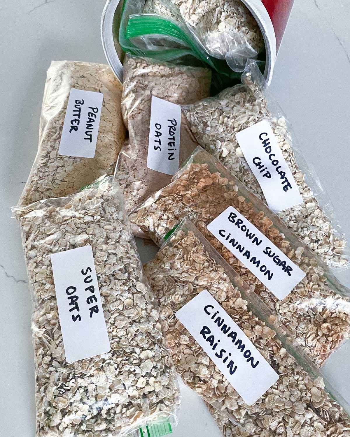 homemade flavored oatmeal packets labeled and lined up on a countertop