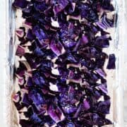 roasted red cabbage pieces in a baking sheet
