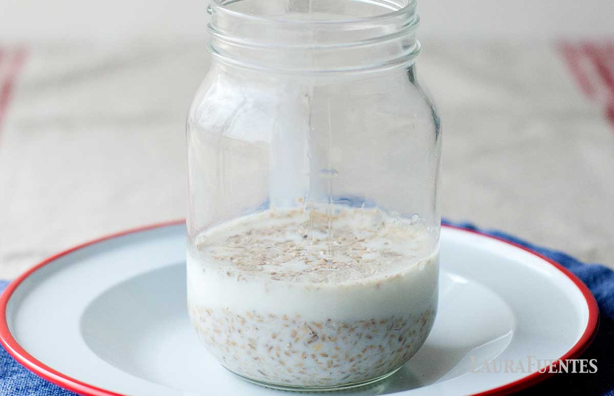 closeup of mason jar filled with steel cut oats and milk
