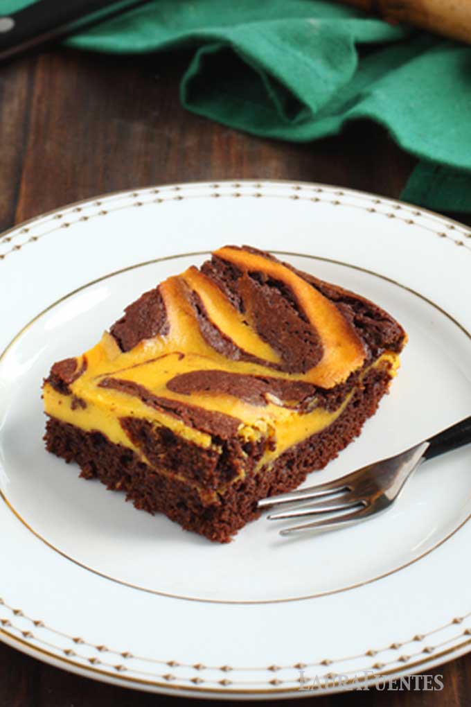 one brownie with pumpkin swirl on a plate