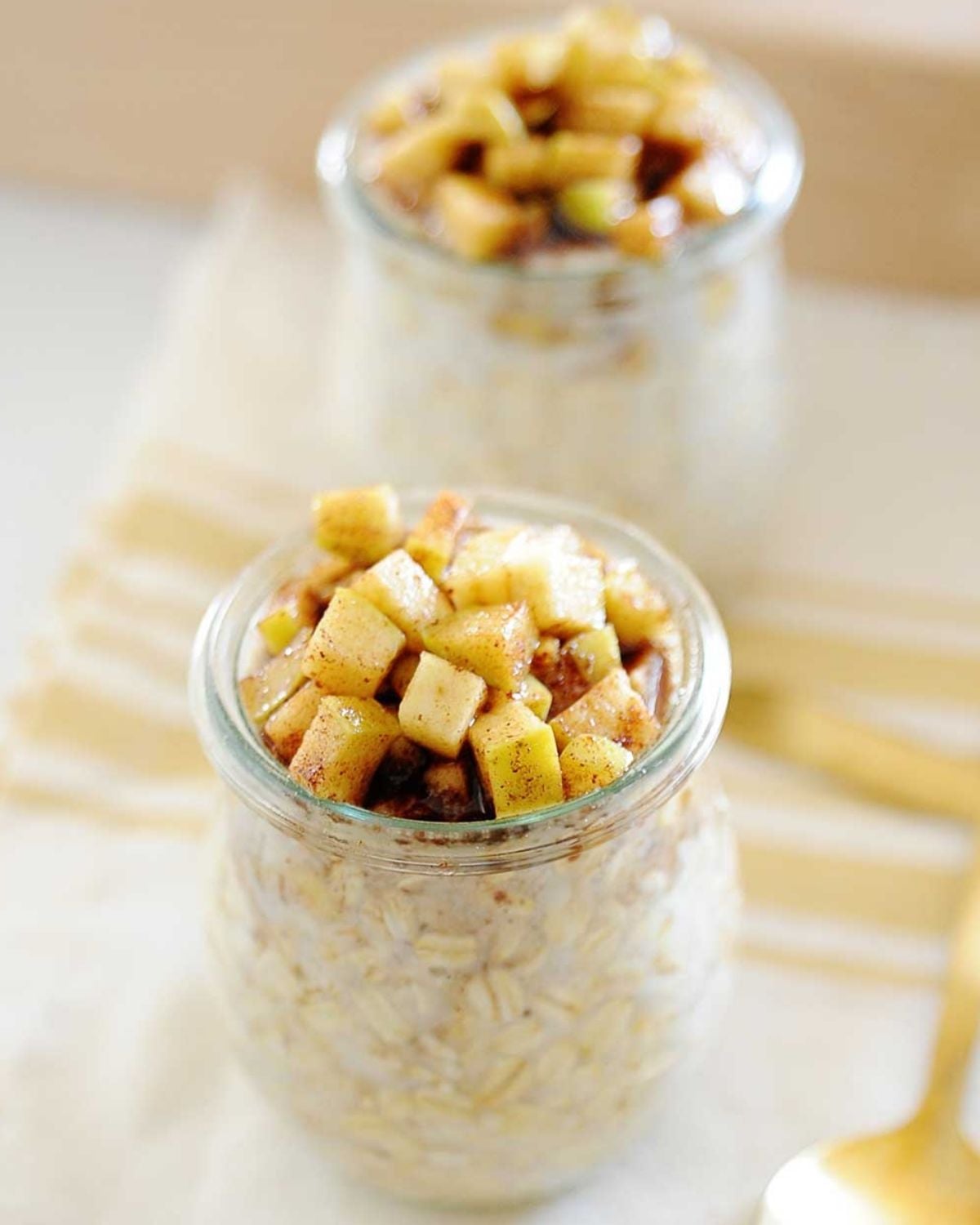 overhead view of two jars of apple cinnamon oats