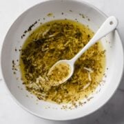 small bowl of lemon chicken marinade after it has been stirred