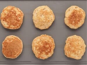 six pancakes in a griddle
