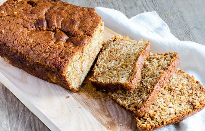 loaf of applesauce bread partially sliced