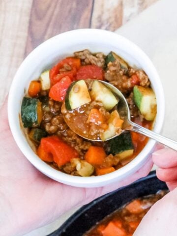 a bowl of paleo chili made with ground meat and veggies