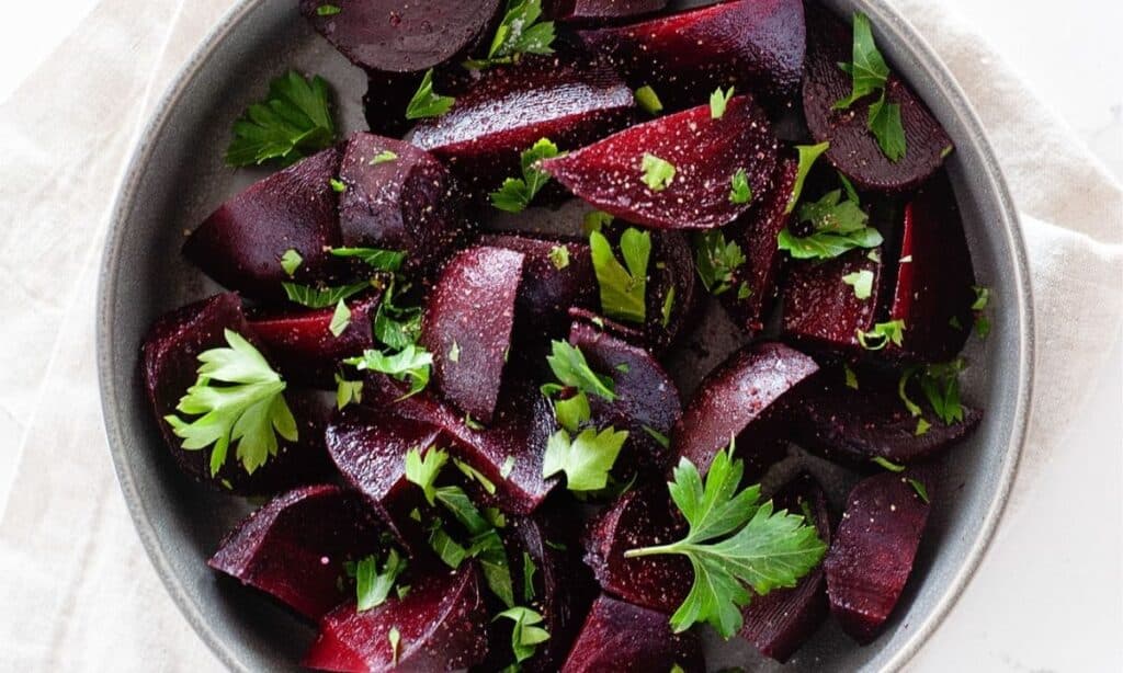 overhead view of a bowl with roasted balsamic beets