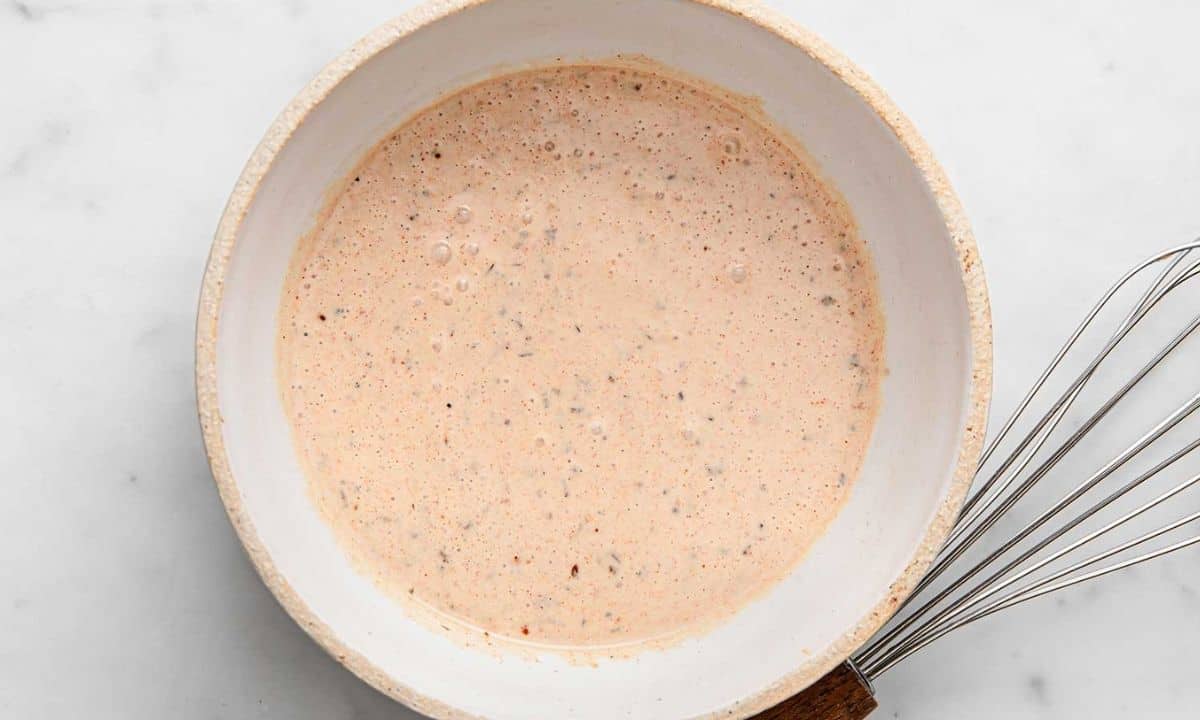 Creole coleslaw dressing in a bowl
