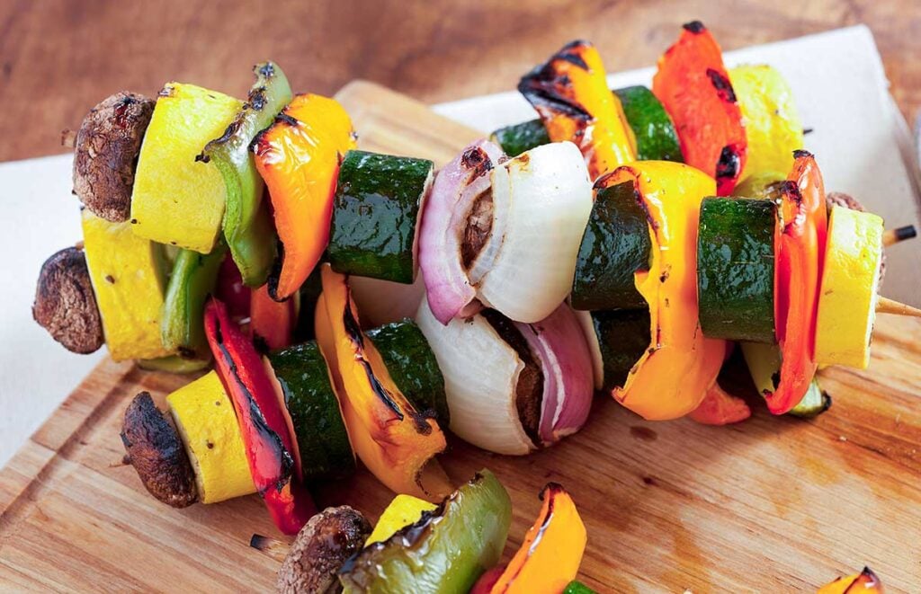 vegetable skewers on a cutting board
