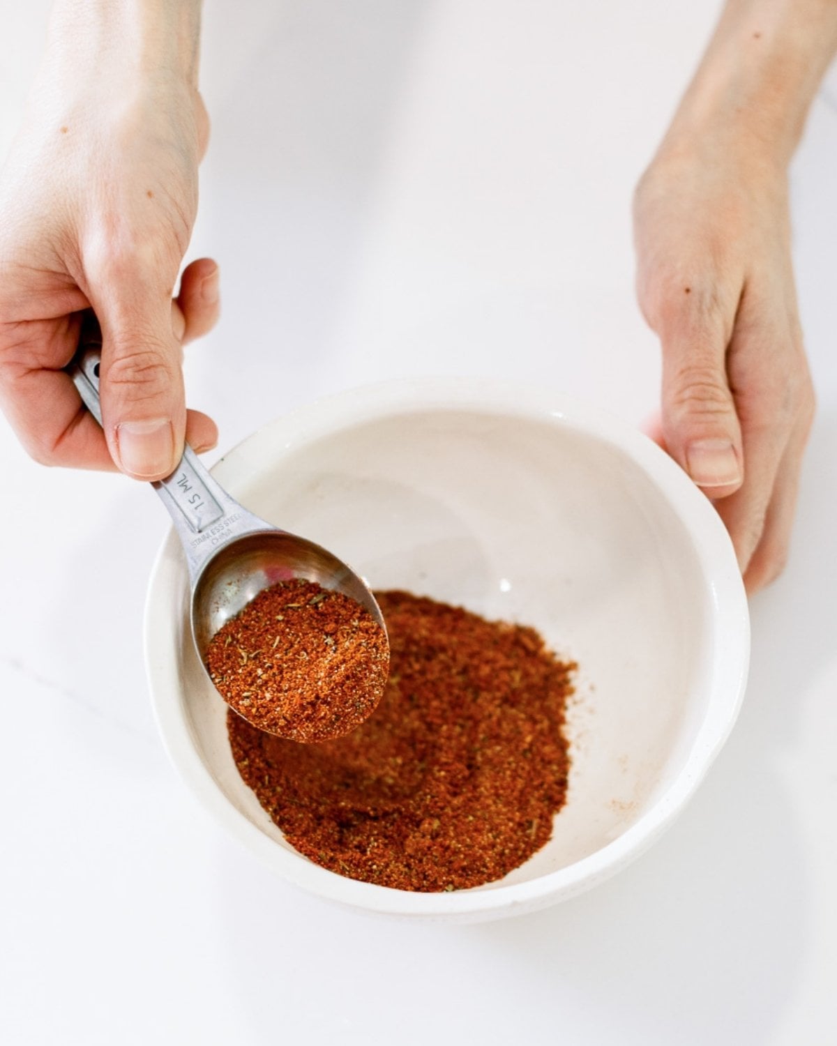 a bowl with homemade creole seasoning