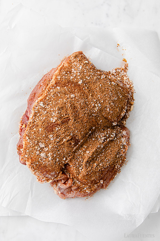 large pork roast covered in dry rub