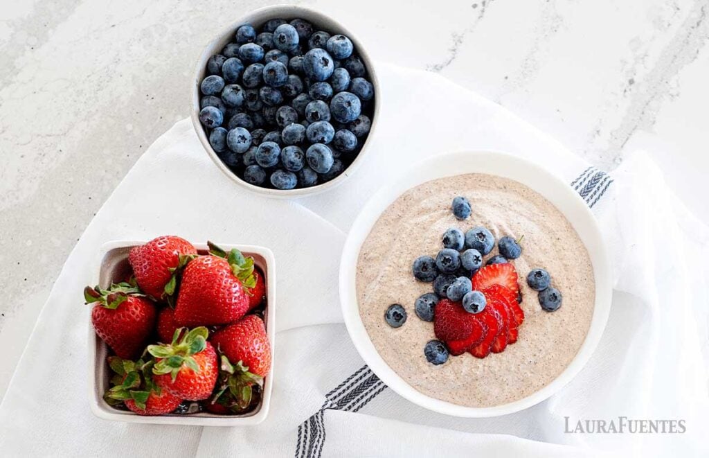 overhead view of a bowl of oatmeal and berries 
