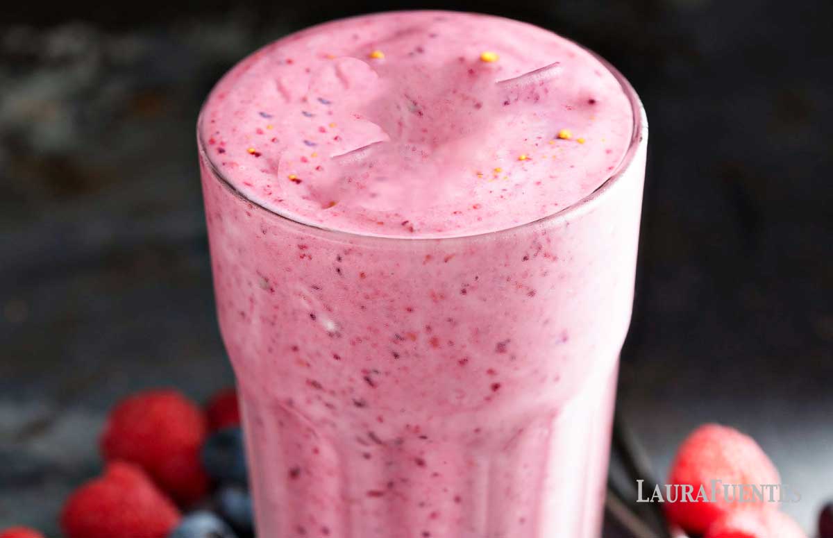 closeup of a triple berry smoothie in a glass