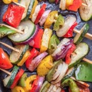 sliced and grilled vegetables on skewers