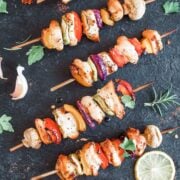 chicken and vegetable skewers laid out flat on a countertop