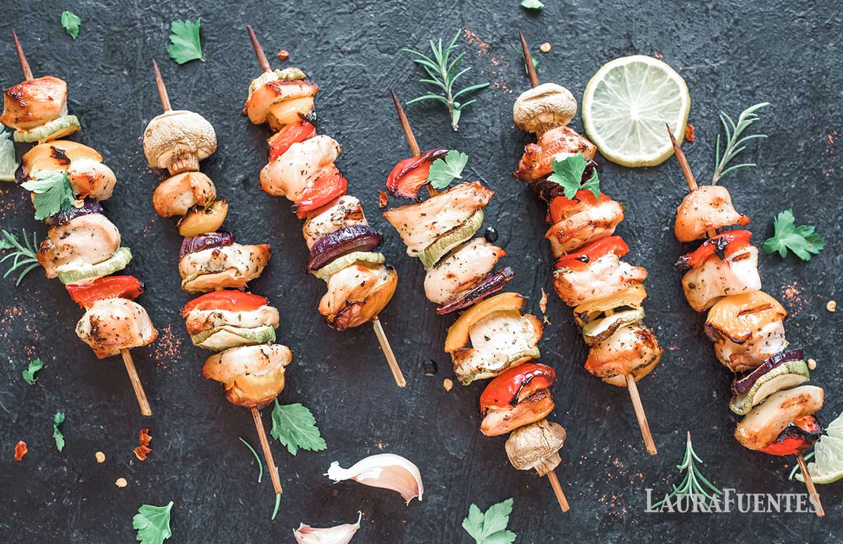 chicken and vegetable skewers laid out flat on a countertop