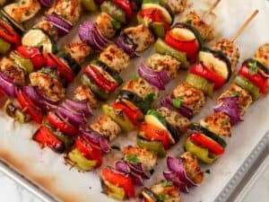 oven kabobs after baking. kabobs are chicken and veggies
