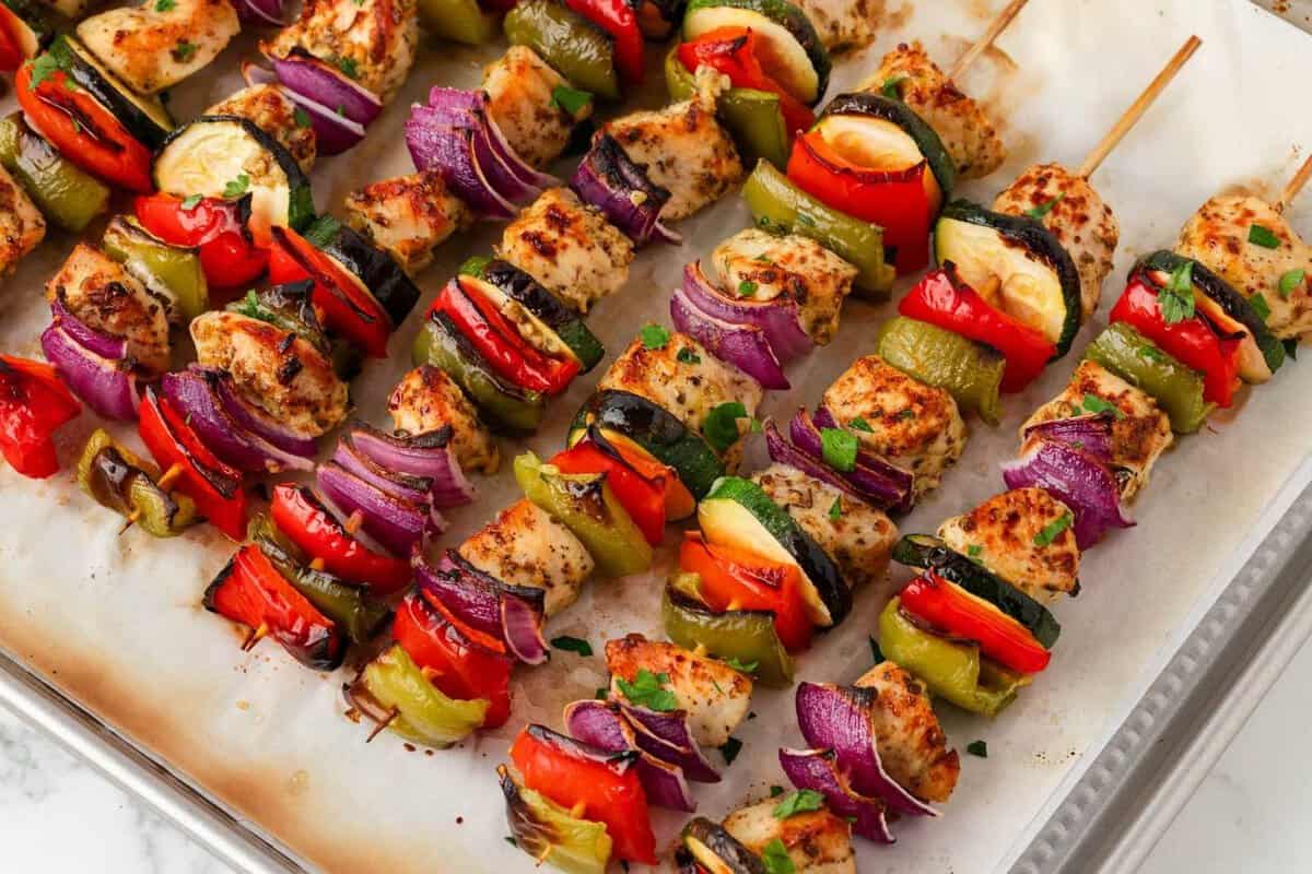 oven kabobs after baking. kabobs are chicken and veggies