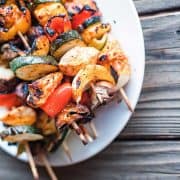 chicken and vegetable skewers on a plate