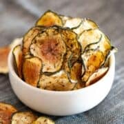 small white bowl of zucchini chips with no breading