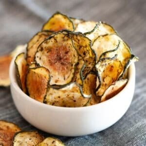 small white bowl of zucchini chips with no breading