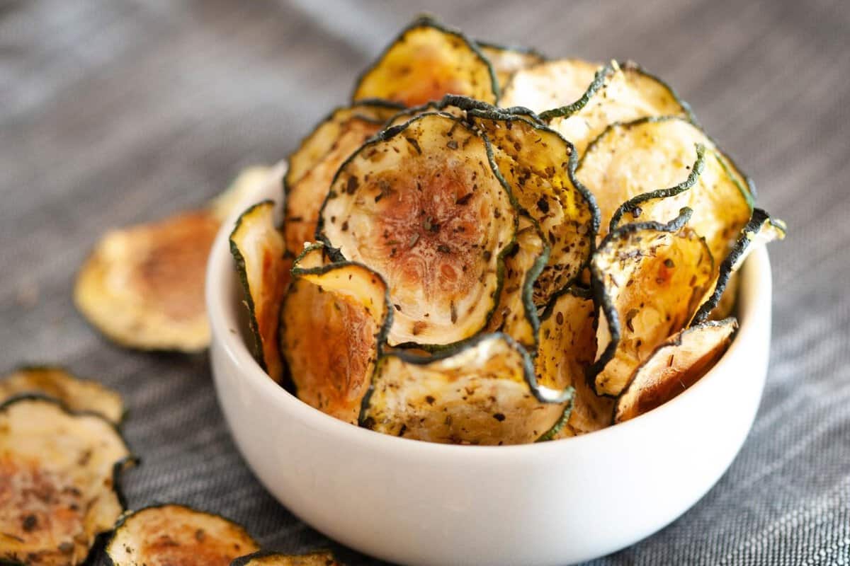 small white bowl of zucchini chips with no breading