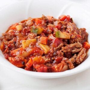 a bowl of ground chicken chili