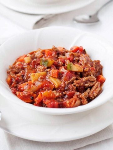 a bowl of ground chicken chili