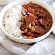 a bowl of chicken gumbo with white rice