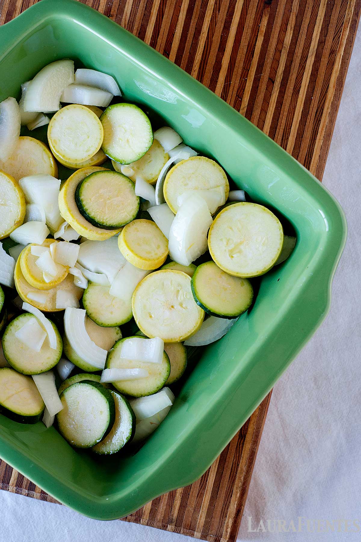 zucchini, onions, and squash are the base for this roasted red pepper hummus chicken recipe