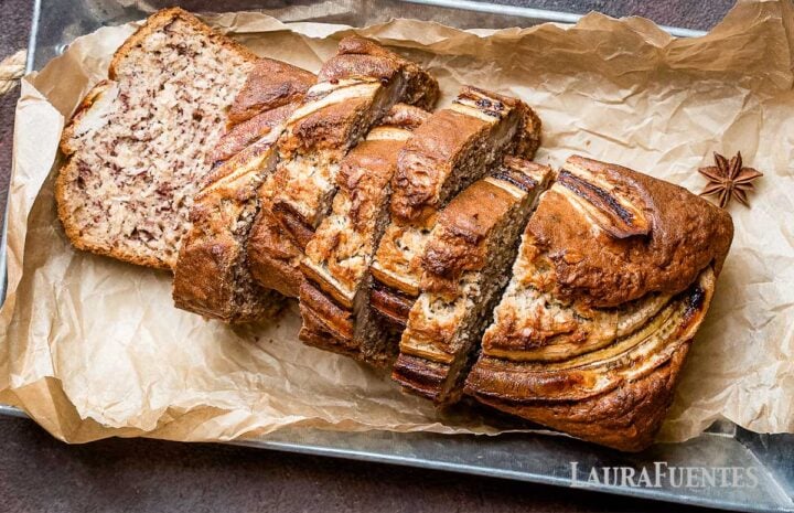 overhead view of banana bread loaf, sliced.