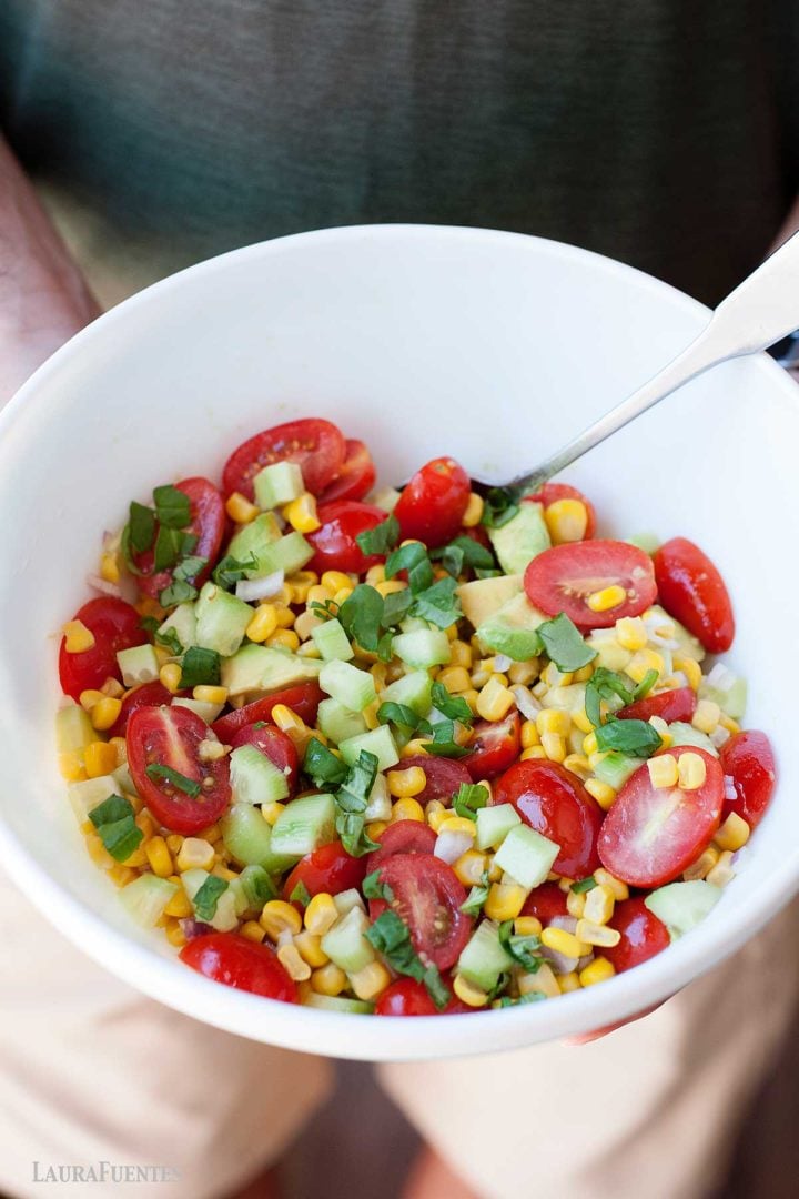 large bowl of corn and tomato salad