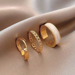 three golden stacking rings