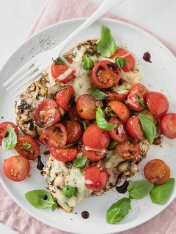 bruschetta chicken breast on a plate