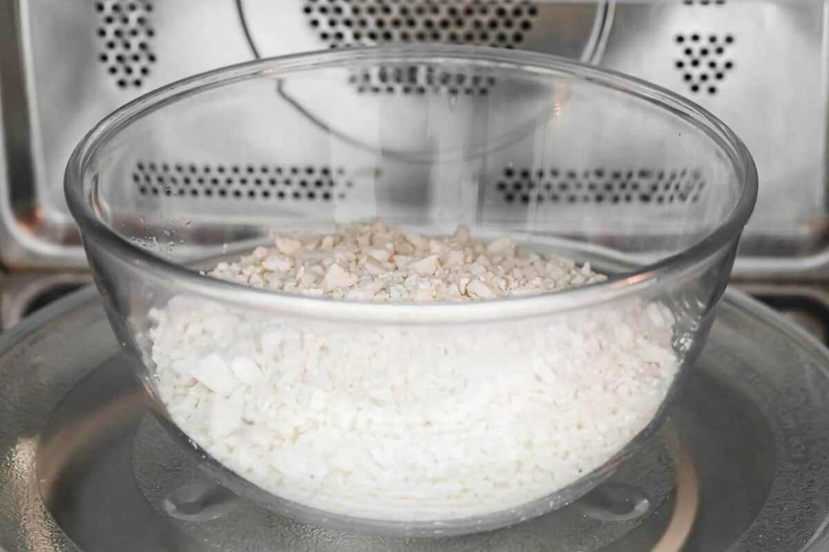 a bowl of cauliflower rice in the microwave