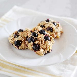 three blueberry breakfast cookies on a plate