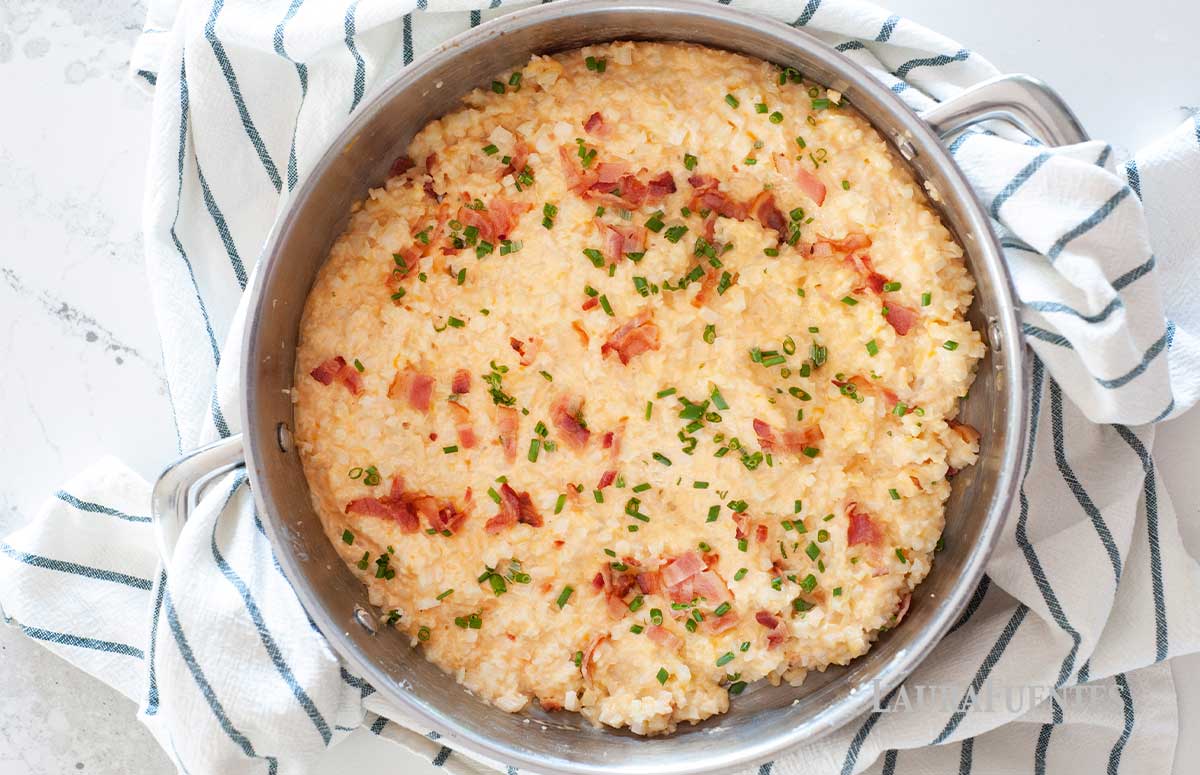 cheesy cauliflower rice in a skillet