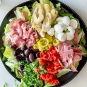 top view of antipasto salad made with charcuterie and veggies