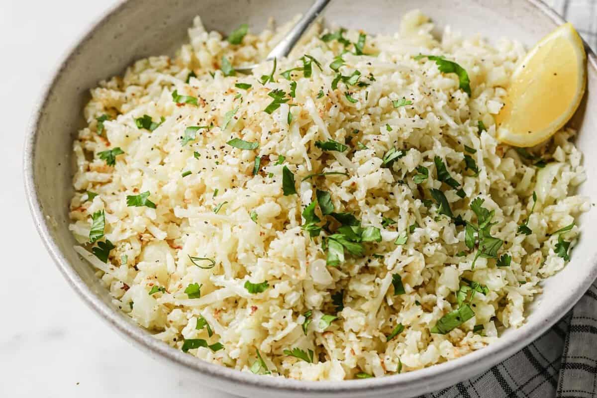 a bowl of cilantro lime cauliflower rice