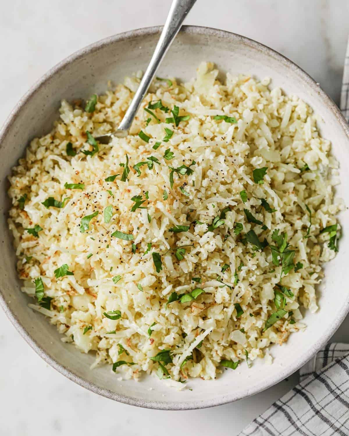 overhead view of a bowl of cilantro lime cauliflower rice