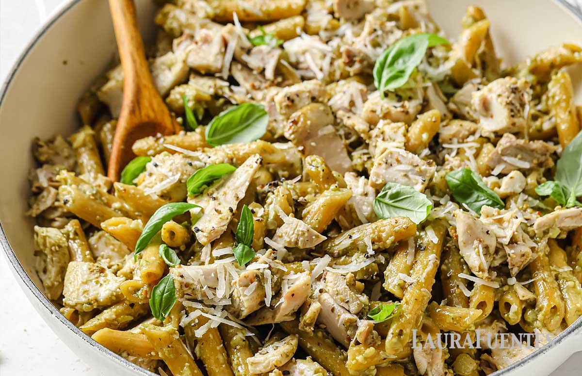 large skillet filled with chicken pesto pasta