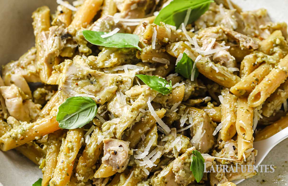 large dinner plate of pesto chicken pasta