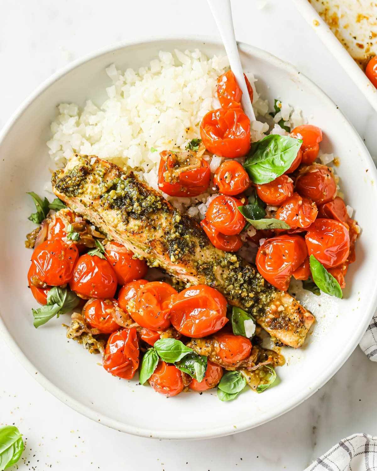 baked pesto salmon with cherry tomatoes and rice