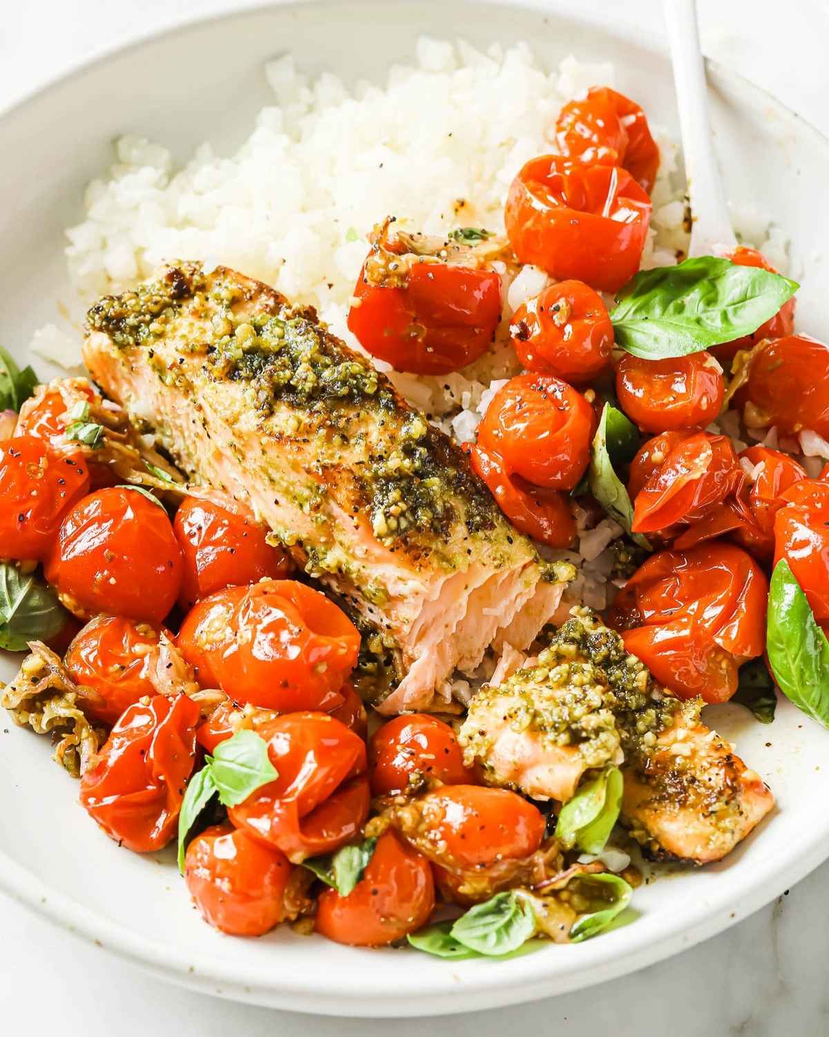 baked pesto salmon with cherry tomatoes and rice