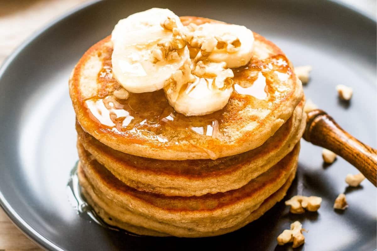 A stack of banana pumpkin pancakes on a plate